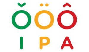 Pessoa em sessão de teleterapia da fala através de um computador